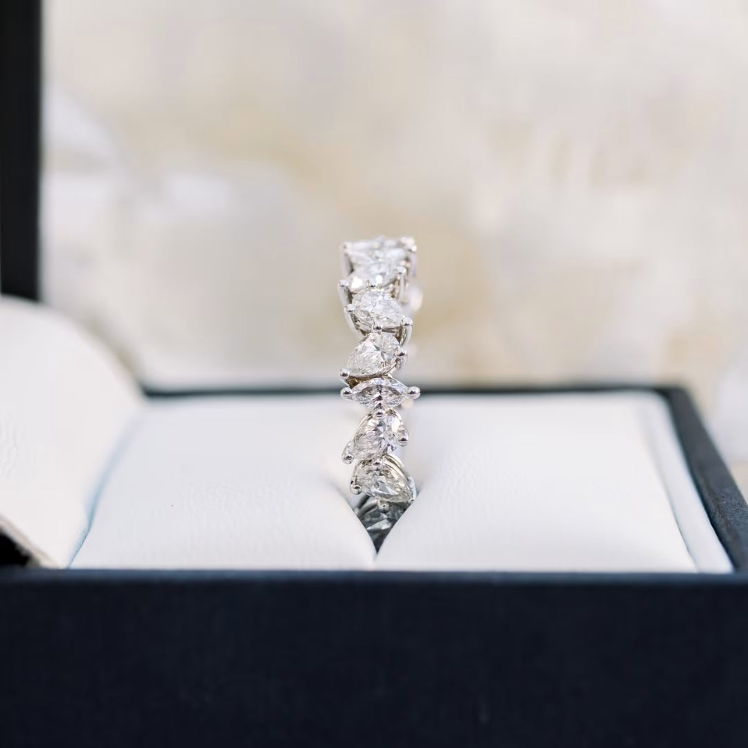 Scintillant Pear Cut Diamond Wedding Band