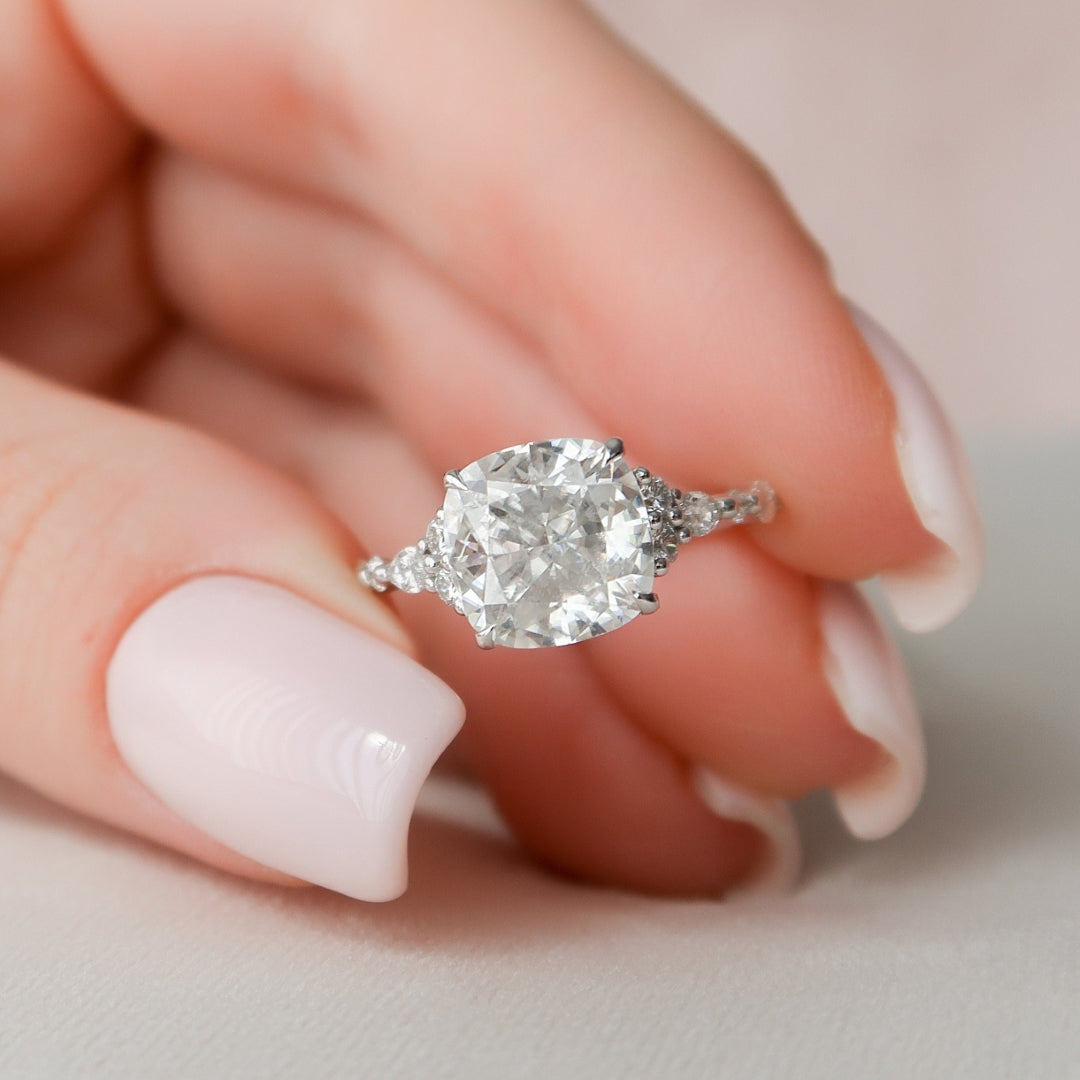 Pave Setting Diamond Ring Featuring a Cushion Cut Brilliance