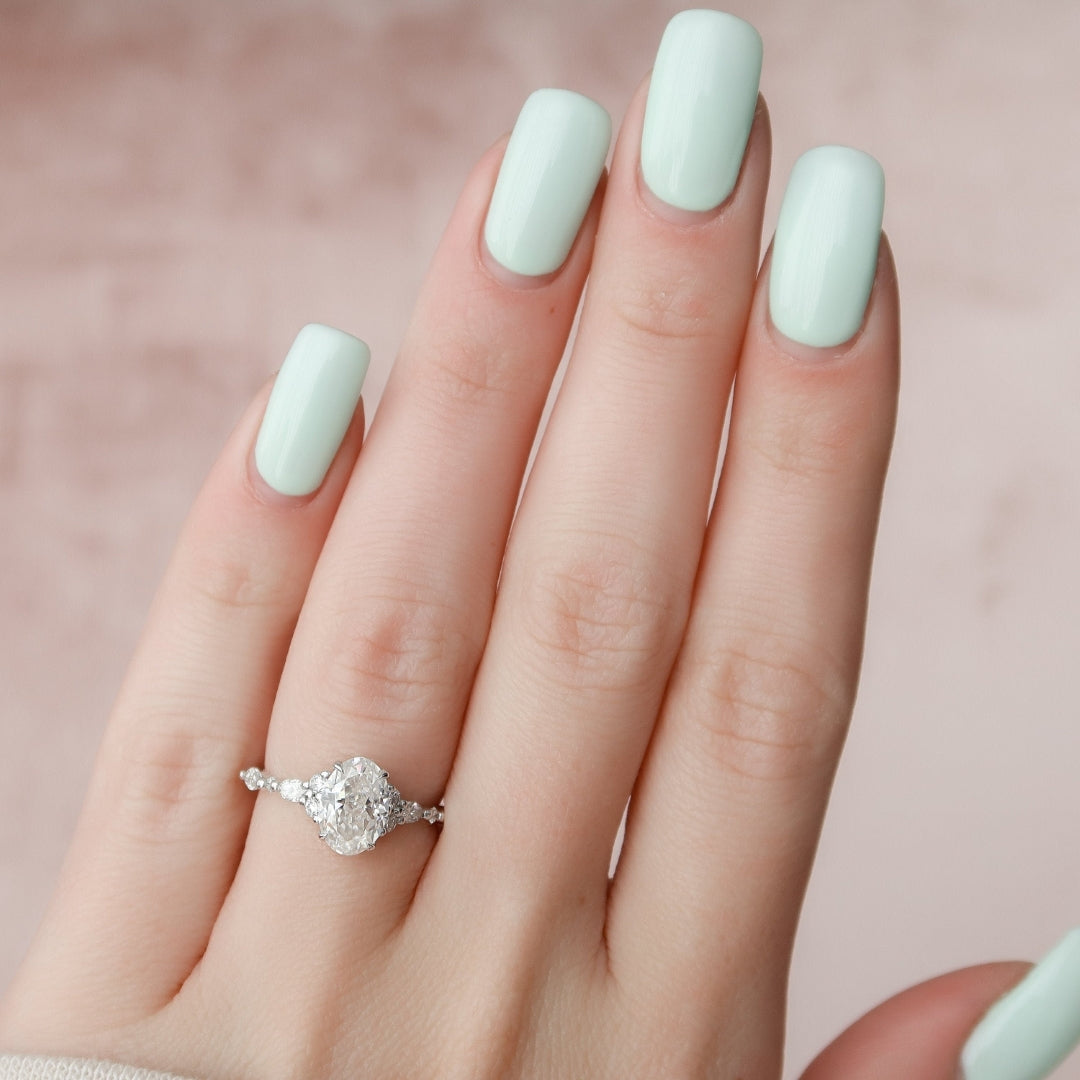 Graceful Side Stone, 2.55 CT Oval Cut Moissanite Wedding Ring