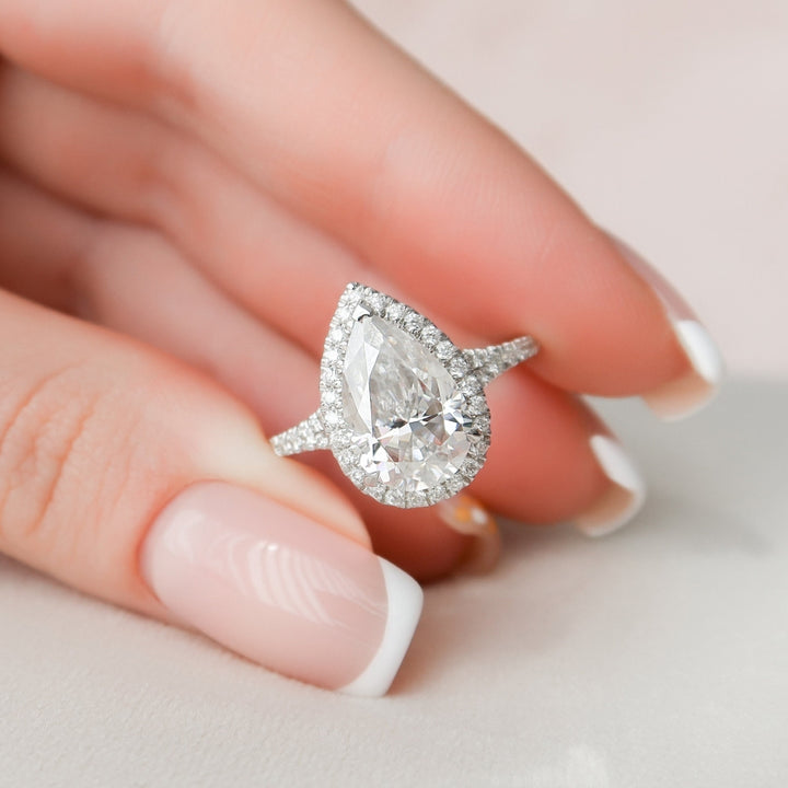 Stunning 3.30 Ct Pear Cut Diamond With Halo For A Dazzling Proposal