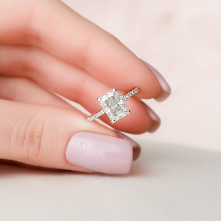 Luminous Beauty Radiant Cut Moissanite Hidden Halo Engagement Ring with Glowing Charm