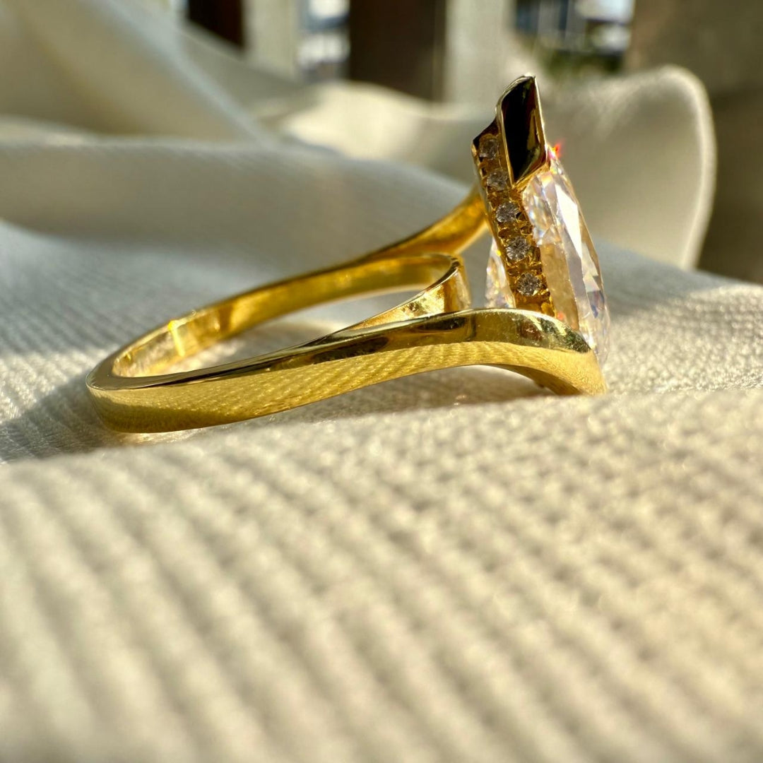 Golden Embrace Pear Cut Solitaire Ring