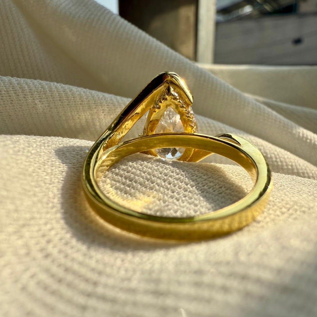 Golden Embrace Pear Cut Solitaire Ring
