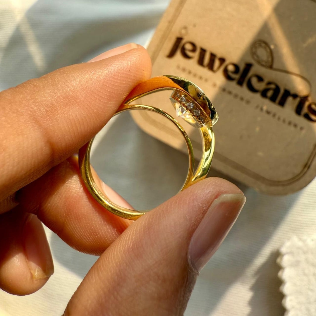 Golden Embrace Pear Cut Solitaire Ring