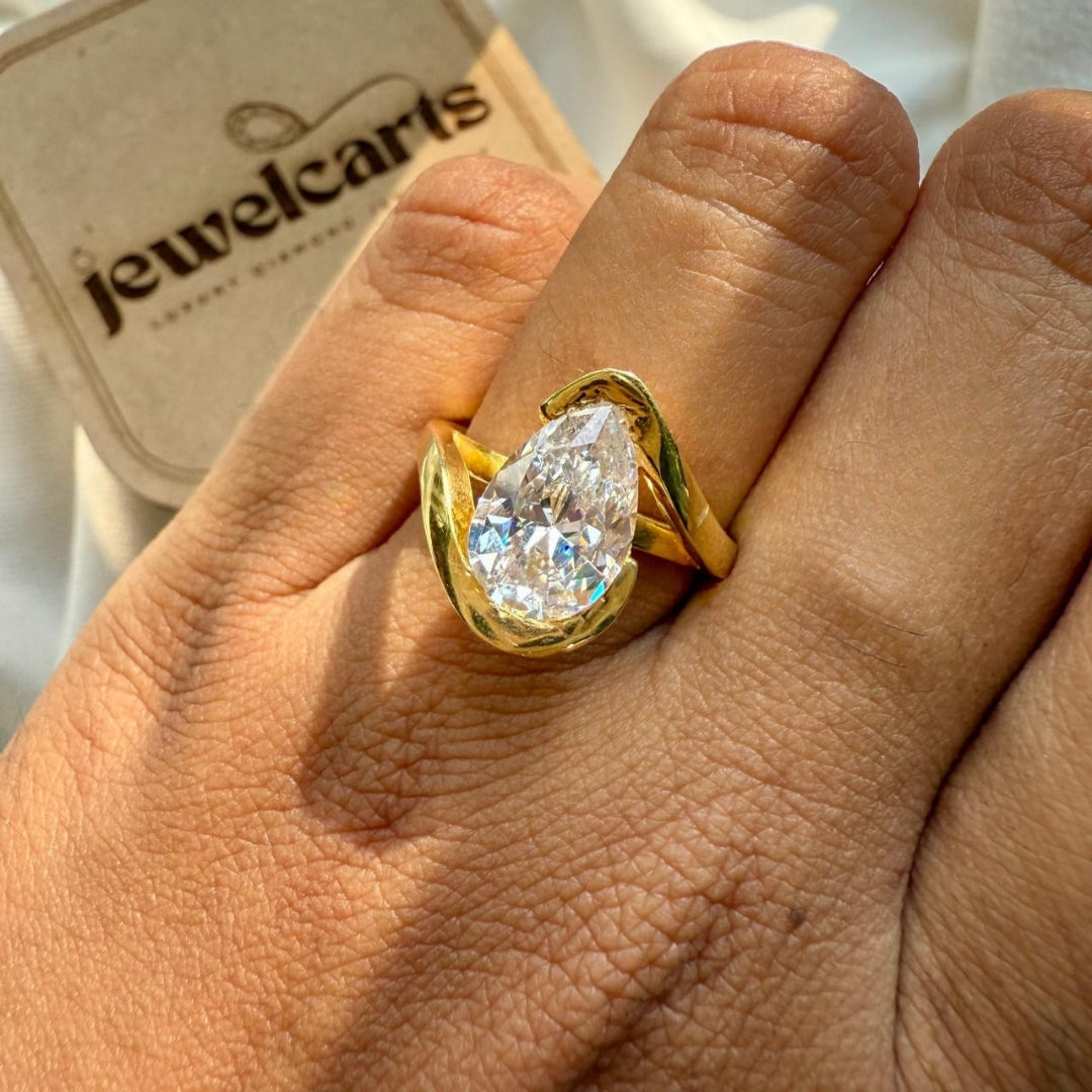Golden Embrace Pear Cut Solitaire Ring