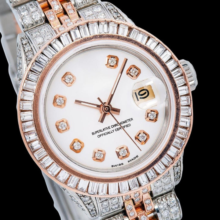 Rolex Datejust Baguette Bezel Diamond Markers White Dial Two Tone Jubilee Bracelet Rose Gold Iced Out Watch Close Up Dial View