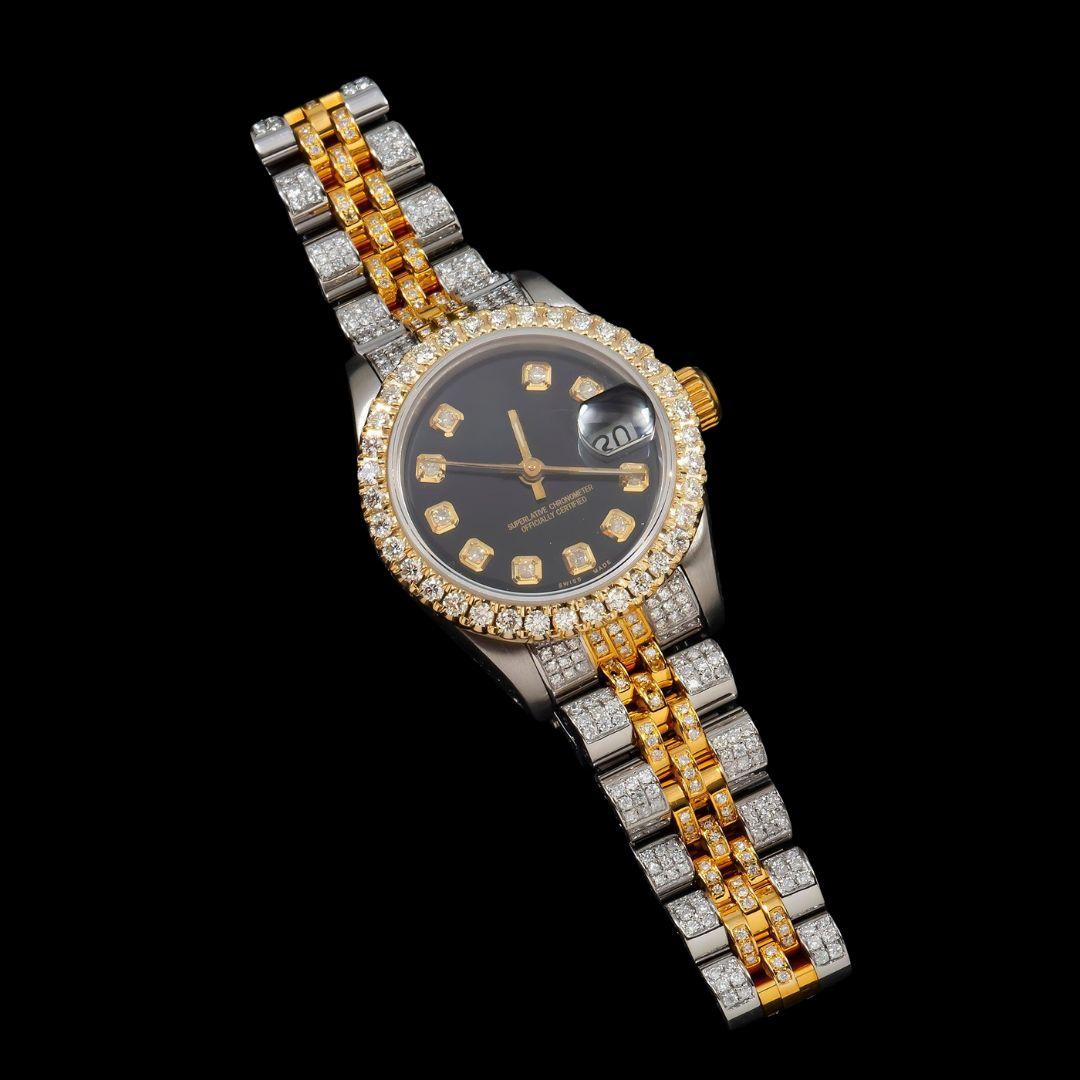 Rolex Datejust Black Dial Diamond Markers Two Tone Yellow Gold Iced Out Jubilee Bracelet Moissanite Watch for Women Close Up Front View