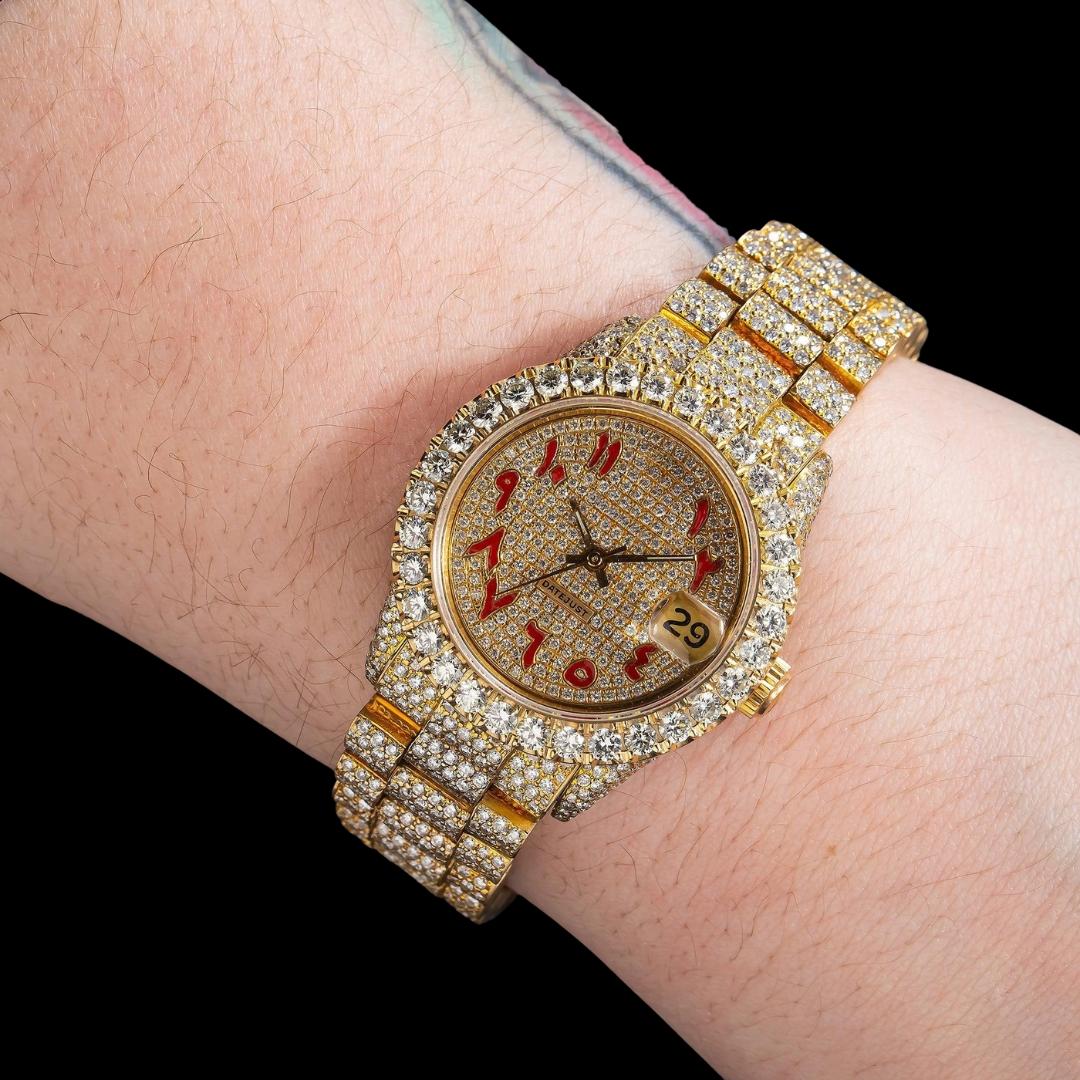 Rolex Diamond Paved Dial Red Arabic Numerals Iced Out President Bracelet Yellow Gold Moissanite Watch On Wrist View