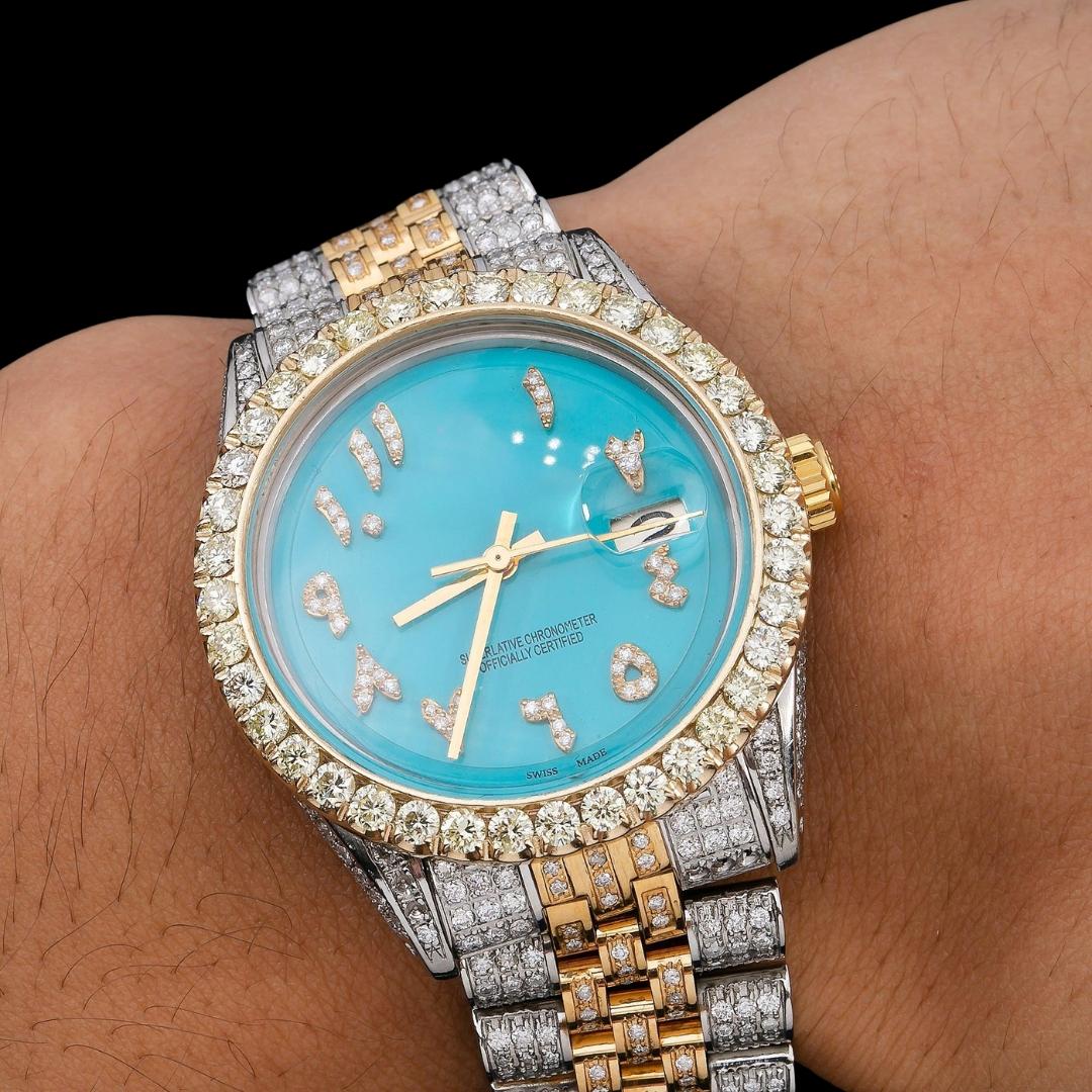 Rolex Tiffany Blue Dial Roman Numerals Two Tone Yellow Gold Jubilee Bracelet Iced Out Moissanite Watch On Wrist View