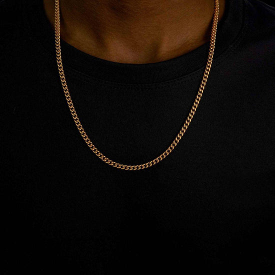 4mm Cuban Link Chain in 14K Yellow Gold Neck View 
