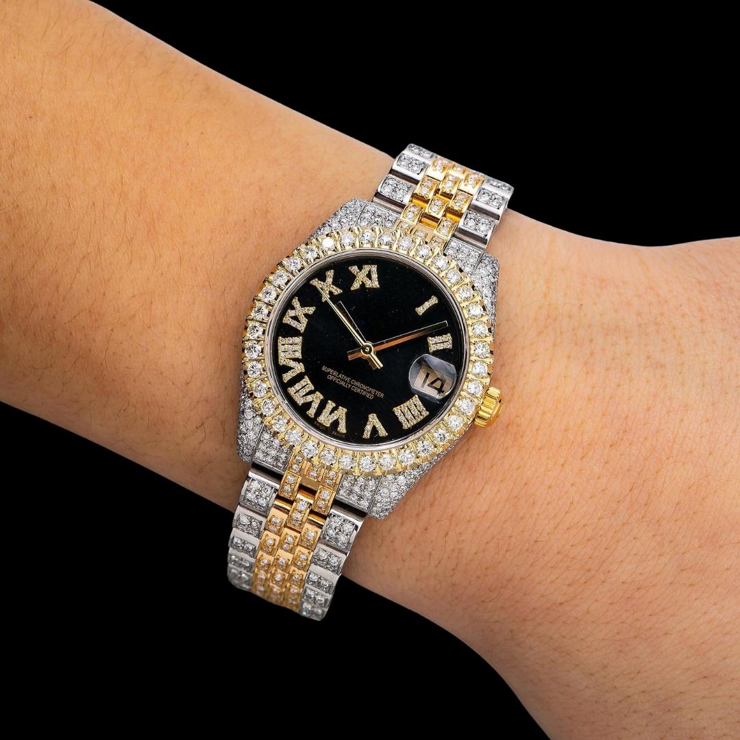 Datejust Rolex Black Dial Diamond Roman Numerals Two Tone Yellow Gold Jubilee Bracelet Iced Out Moissanite Watch On Wrist View