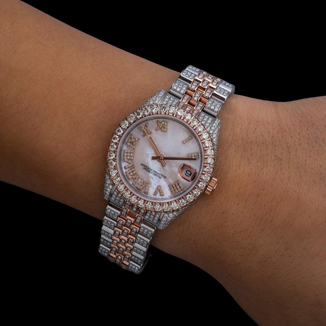 Datejust Rolex White Pearl Roman Diamond Dial Two Tone Rose Gold Jubilee Bracelet Iced Out Moissanite Watch On Wrist View