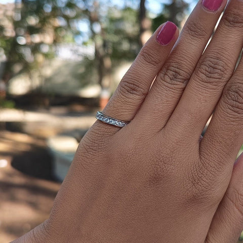 Improbable Round Cut Diamond Wedding Band