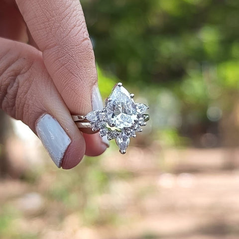 Sleek-Swirls Pear Cut Diamond Anniversary Ring