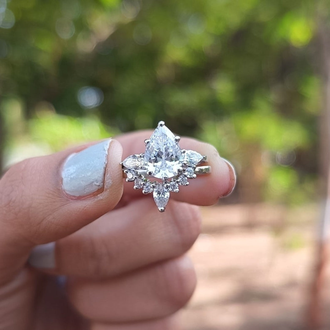 Sleek-Swirls Pear Cut Diamond Anniversary Ring