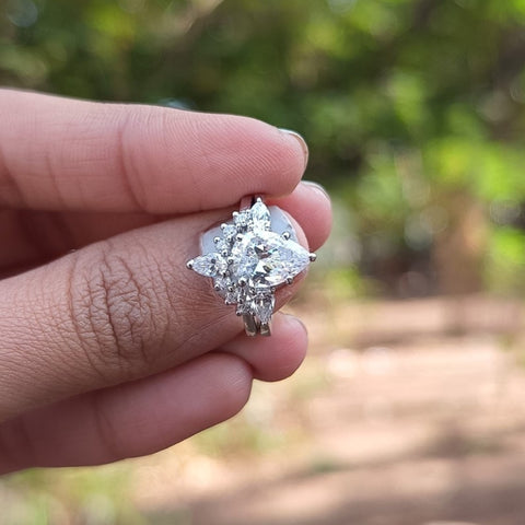 Sleek-Swirls Pear Cut Diamond Anniversary Ring