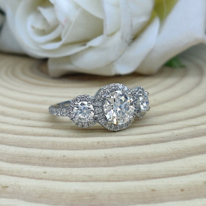 Comparatively Round Cut Diamond Engagement Ring