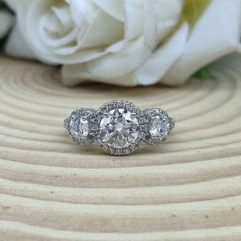 Comparatively Round Cut Diamond Engagement Ring