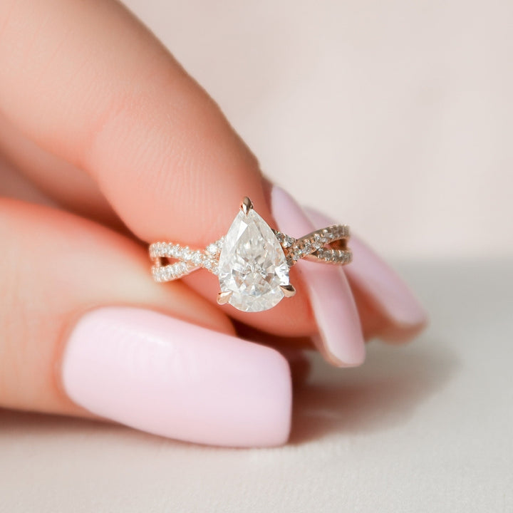 Alluring Radiance 2.35 CT Pear Cut Moissanite Engagement Ring with a Hidden Halo Sparkle