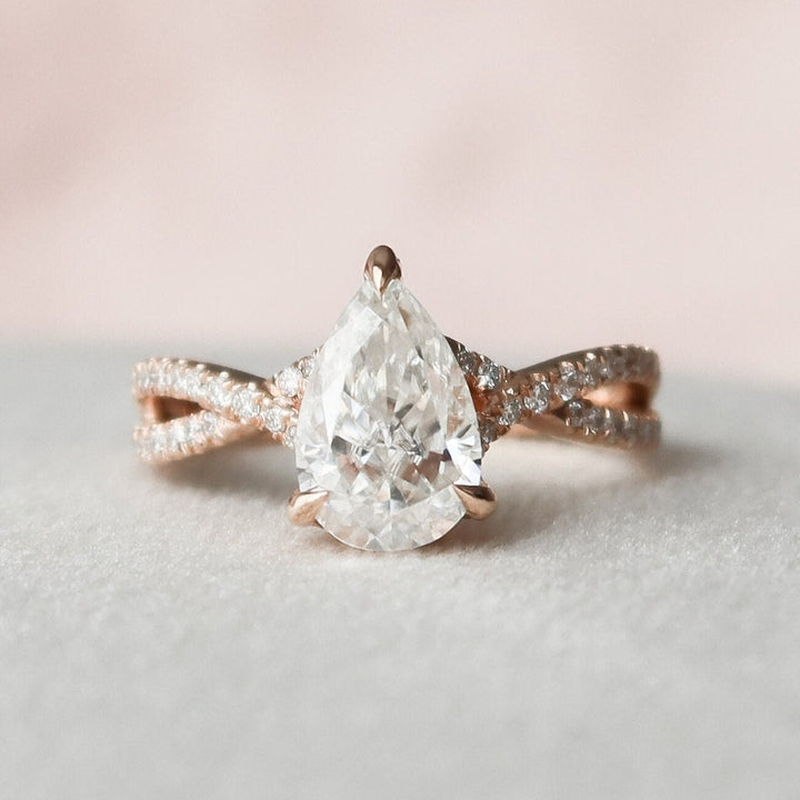 Alluring Radiance 2.35 CT Pear Cut Moissanite Engagement Ring with a Hidden Halo Sparkle
