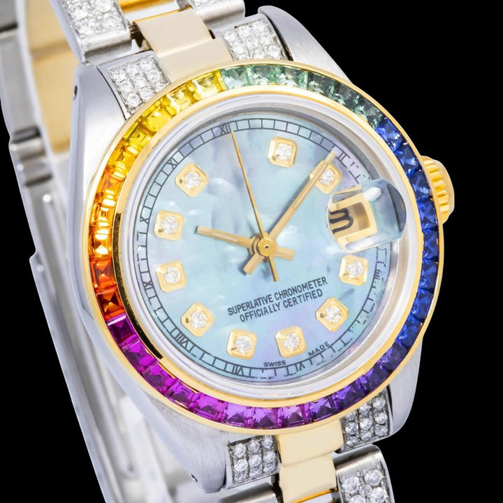 Rolex Datejust Blue Pearl Dial Rainbow Bezel Two Tone Yellow Gold Semi Iced Oyster Bracelet Moissanite Watch Close Up Dial View