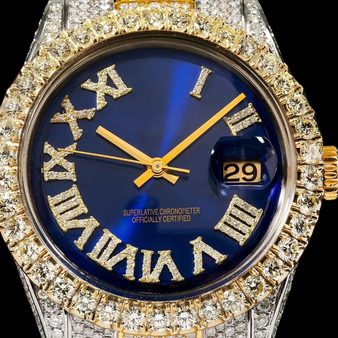 Rolex Datejust Blue Roman Diamond Dial Two Tone Yellow Gold Full Iced Out Jubilee Bracelet Moissanite Watch Close Up Numerals View