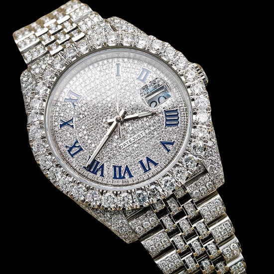 Rolex Datejust Diamond Pave White Dial Blue Arabic Numerals Fully Iced Out Oyster Bracelet Moissanite Watch Close Up Front View