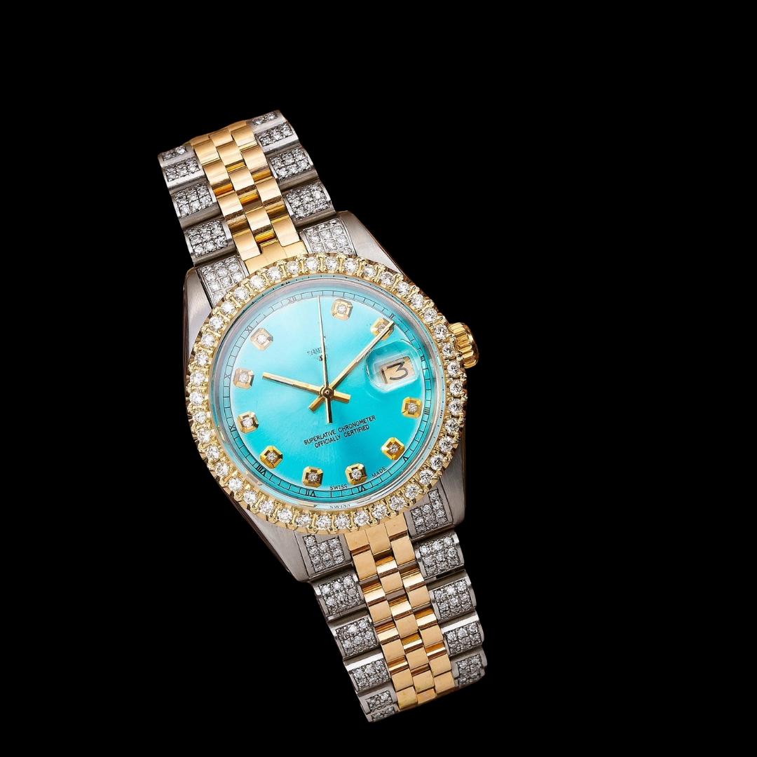 Rolex Datejust Turquoise Blue Dial Diamond Markers Two Tone Yellow Gold Iced Out Jubilee Bracelet Moissanite Watch Close Up Front View