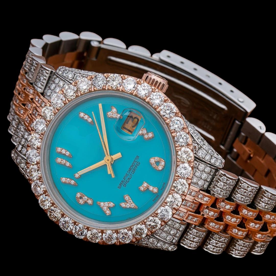Rolex Datejust Turquoise Dial Diamond Arabic Numerals Two Tone Rose Gold Jubilee Bracelet Full Iced Out Watch Close Up Front View