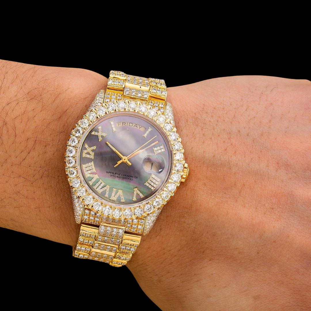 Rolex Day-Date Black Pearl Dial Roman Numerals Yellow Gold President Bracelet Iced Out Moissanite Watch On Wrist View