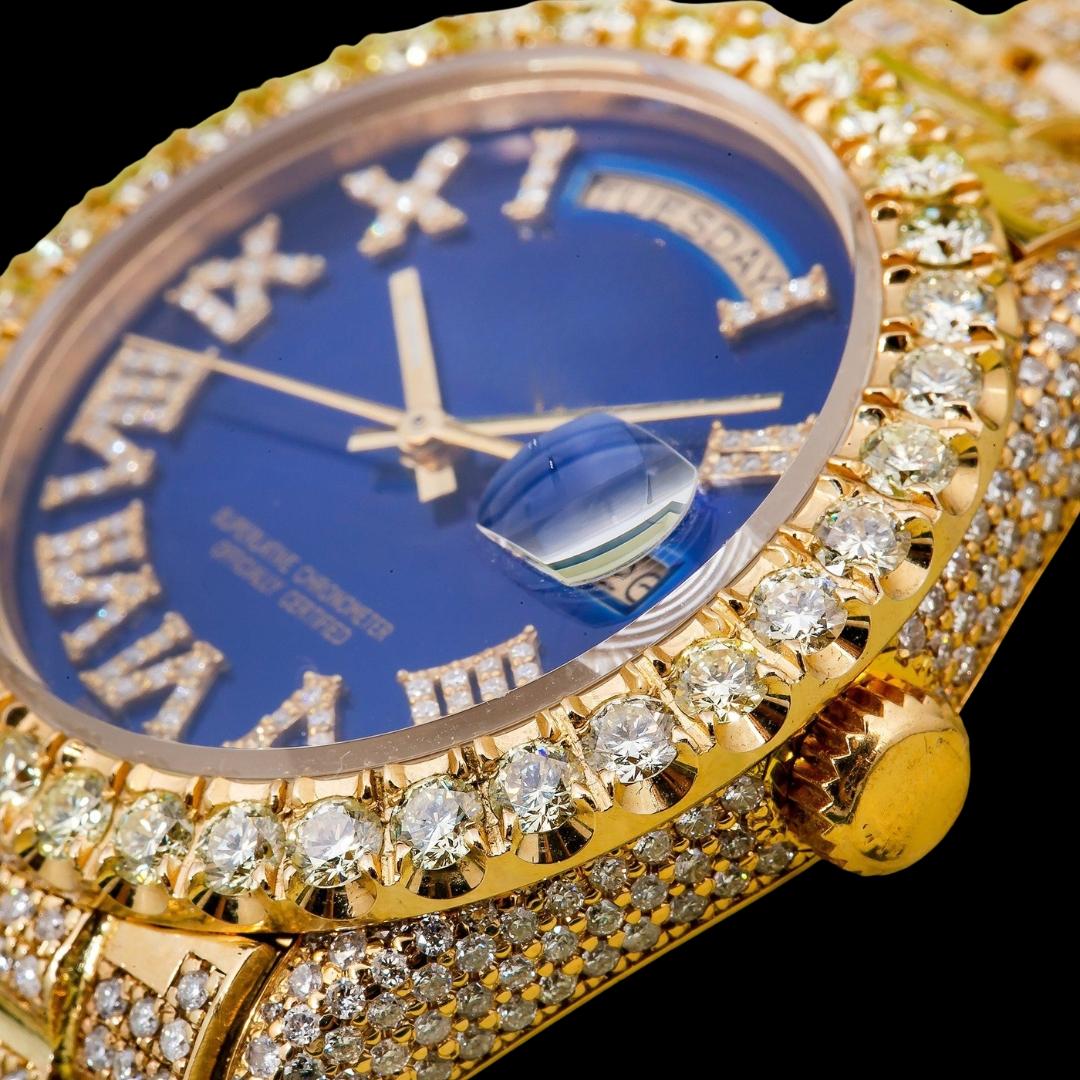Rolex Day-Date Diamond Roman Blue Dial Full Iced Out President Bracelet Yellow Gold Moissanite Watch Close Up Bezel View