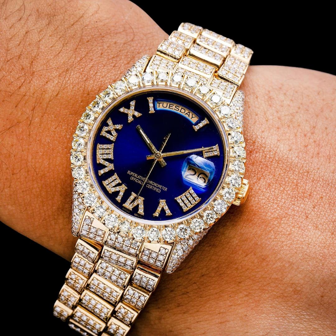 Rolex Day-Date Diamond Roman Blue Dial Full Iced Out President Bracelet Yellow Gold Moissanite Watch On Wrist View