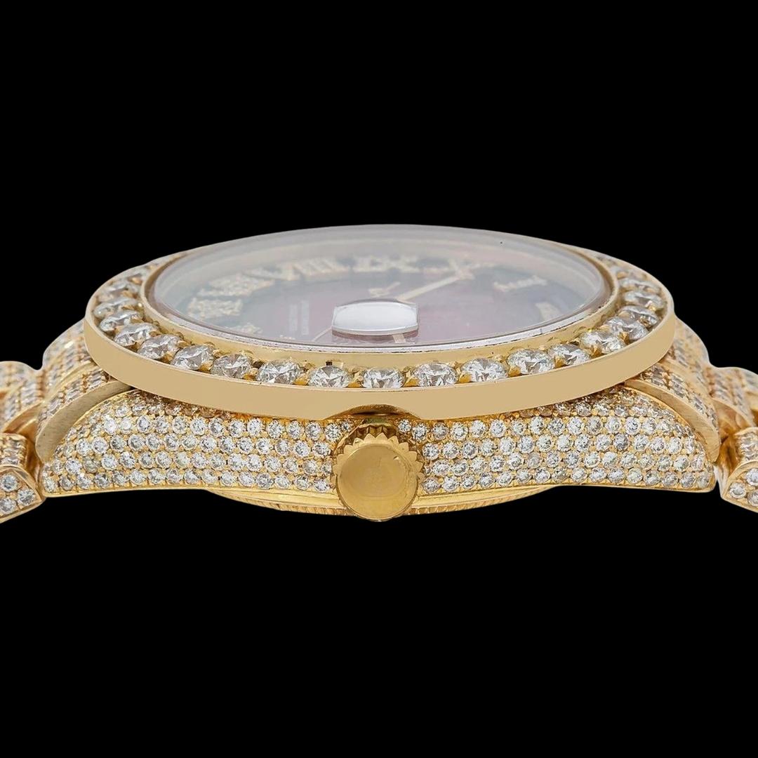 Rolex Day-Date Ruby Red Dial Diamond Roman Numerals Fully Iced Out Yellow Gold President Bracelet Watch Crown View