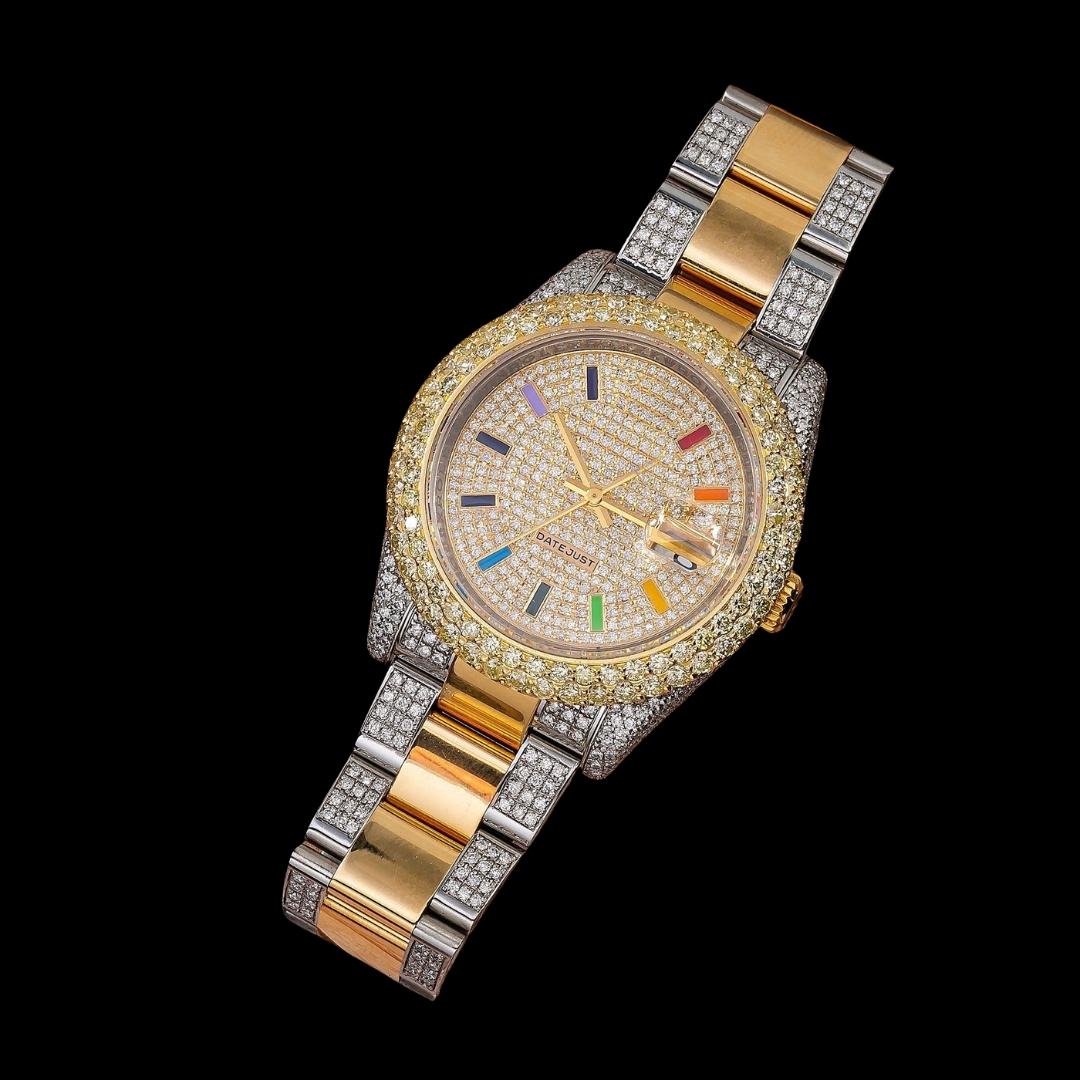 Rolex Diamond Paved Rainbow Stick Markers Dial Two Tone Yellow Gold Semi Iced Oyster Bracelet Watch Close Up Front View