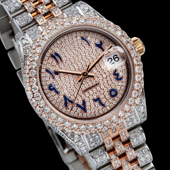 Rolex Rose Gold Diamond Paved Dial Blue Arabic Numerals Two Tone Jubilee Bracelet Iced Out Moissanite Watch Close Up Dial View