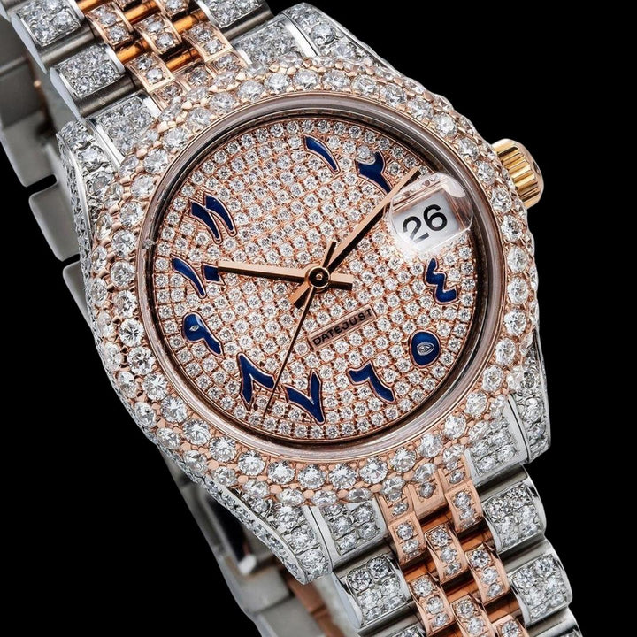 Rolex Rose Gold Diamond Paved Dial Blue Arabic Numerals Two Tone Jubilee Bracelet Iced Out Moissanite Watch Close Up Dial View