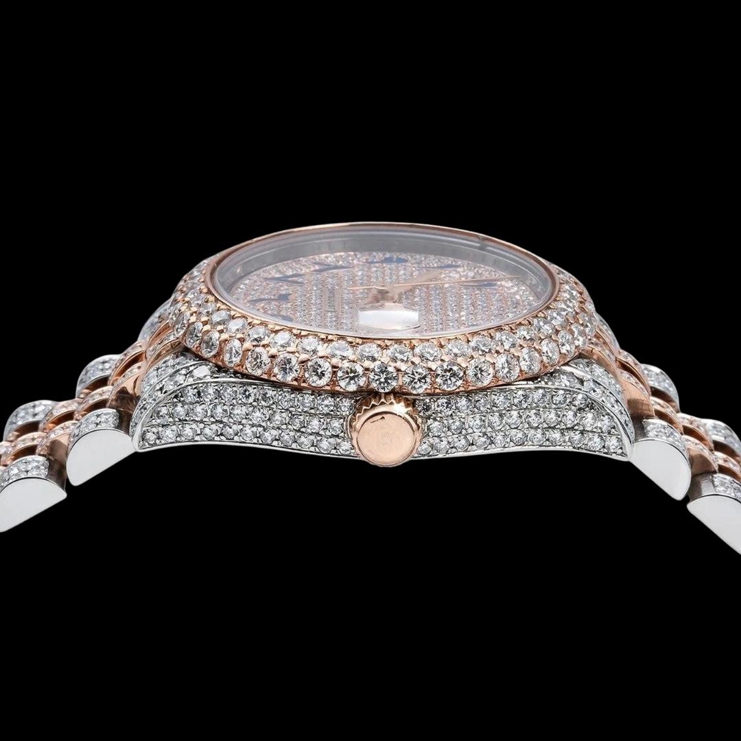 Rolex Rose Gold Diamond Paved Dial Blue Arabic Numerals Two Tone Jubilee Bracelet Iced Out Moissanite Watch Crown View