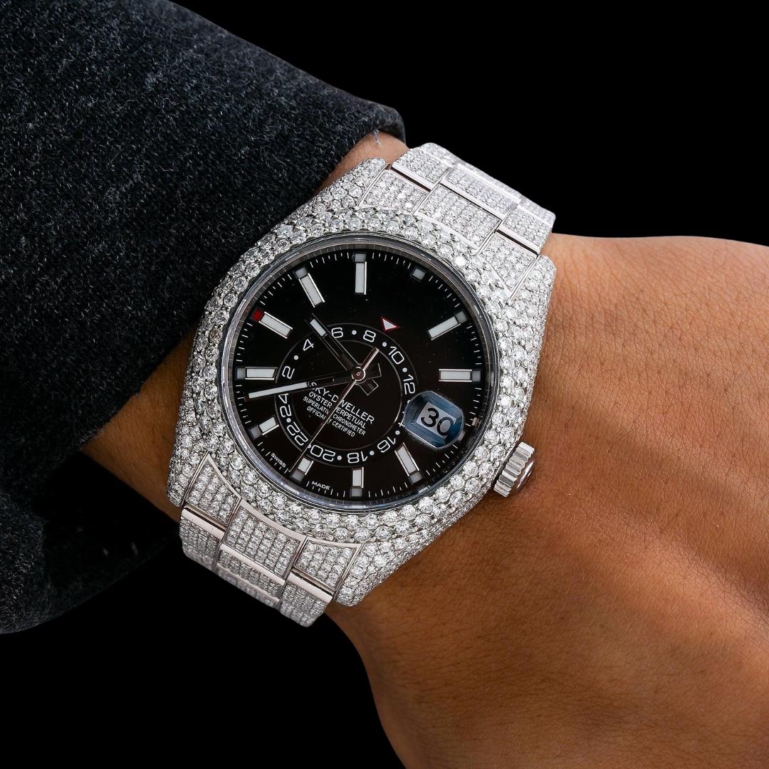 Rolex Sky-Dweller Black Dual Time Dial White Stick Markers Oyster Bracelet Iced Out Moissanite Watch On Wrist View